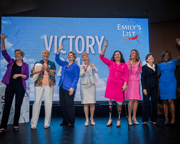 Image of EMILYs List candidates who have been elected to congress, gathered at a conference.